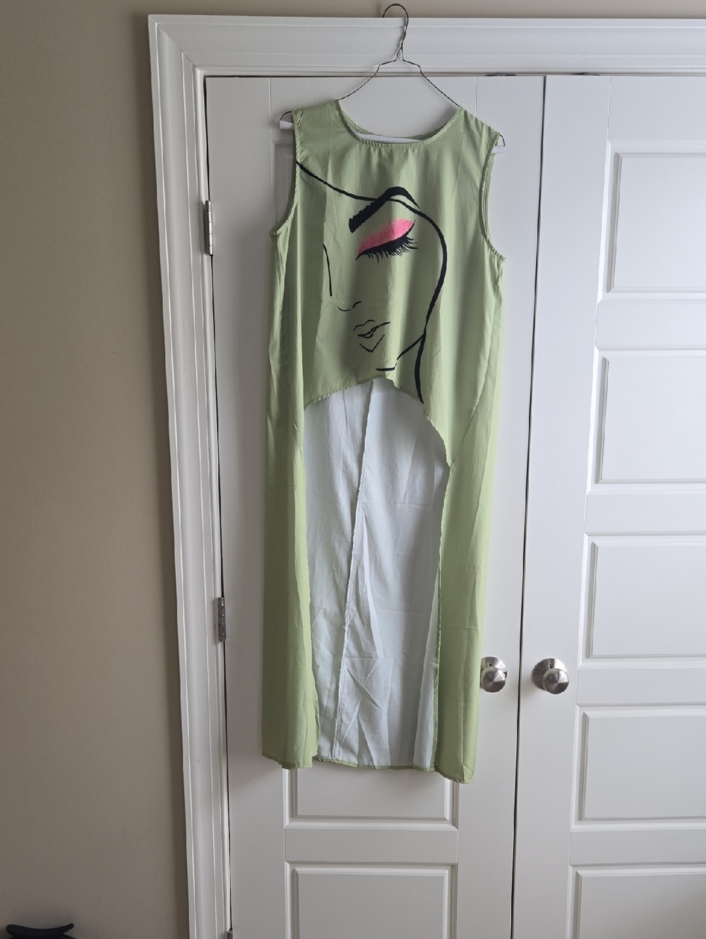 Women's Light Green Sleeveless Tunic with Face Graphic